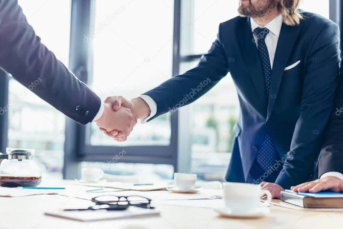 Handshake representing long-term client partnership